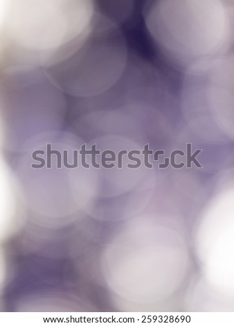 vertical violet blur abstraction with large light and dark circles