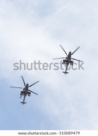 Moscow - May 9, 2015: Demonstration flight of Mi-35 helicopters in the sky over Red Square May 9, 2015, Moscow, Russia