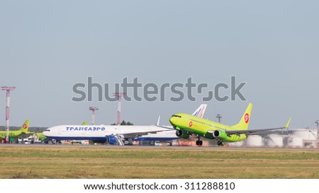 Moscow - August 6, 2015: A passenger plane Boeing 737-8GJ S7 Airlines, tail number VQ-BVK takes off at Domodedovo airport and on the background of bright blue sky on Aug. 6, 2015, Moscow, Russia