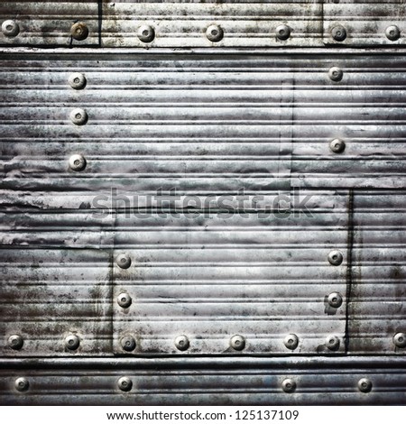 grunge garage wall, stripped metal texture with rivets