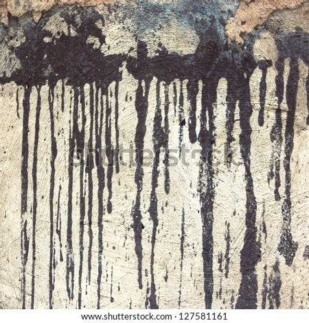 black painted drip on cement  wall ; grunge background