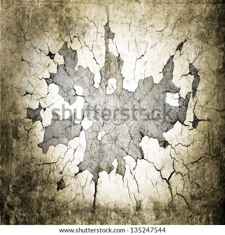 chipped paint hole on shabby wall ; abstract grunge background