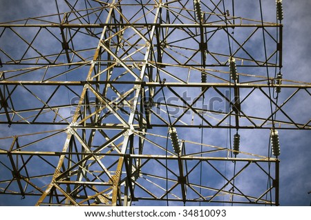 electrical pylon against blue sky / industrial background / concept for infrastructure