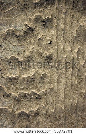 close up of zen-like stone surface with wave pattern / abstract grunge background