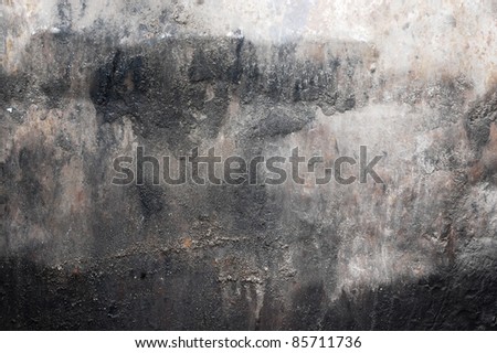 black dirt (dust) on white wall, grunge background