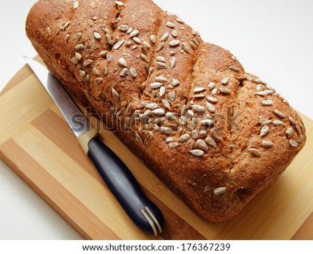 Bran bread, sprinkled with seeds and cooked at home