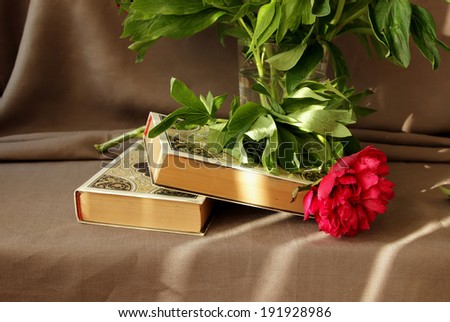 two books and peony