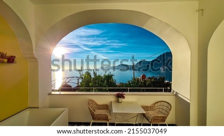 Panoramic sea view from luxury apartment on the Mediterranean Sea. Terrace balcony with arch overlooking the coastline in Praiano, Amalfi Coast, Campania, Italy, Europe. Summer vacation vibes. Awe Foto d'archivio © 