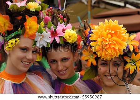BELGRADE - JUNE 20: Belgrade Boat Carnival, Three beautiful girls with flowers in hair, June 20, 2010 in Belgrade, Serbia.