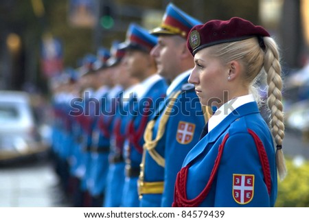 BELGRADE, SERBIA - SEPTEMBER 10: Girl member of Serbian military guard of honor during promotion of new Serbian army officers on September 10, 2011 in Belgrade, Serbia