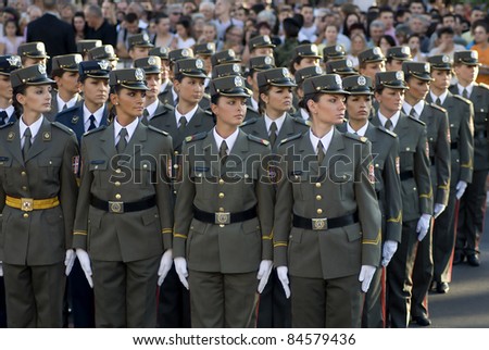 BELGRADE, SERBIA - SEPTEMBER 10: Girls cadet unit during promotion of new Serbian army officers on September 10, 2011 in Belgrade, Serbia