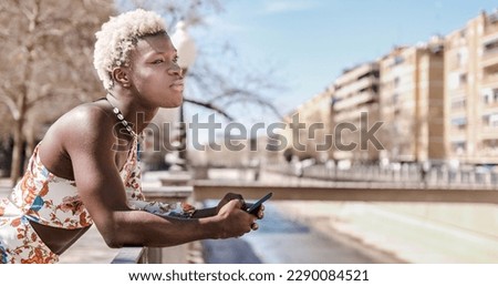 Similar – Image, Stock Photo Queer speaking on smartphone on white background