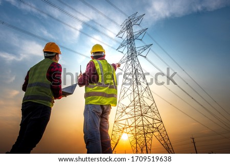 Similar – Image, Stock Photo Silhouette high voltage electric pylon and electrical wire with an orange sky. Electricity poles at sunset. Power and energy concept. High voltage grid tower with wire cable at distribution station.