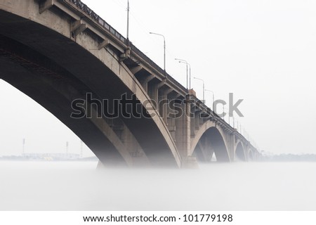 Russia, Krasnoyarsk. Kommunalny Bridge - the automobile and foot bridge through the river Yenisei