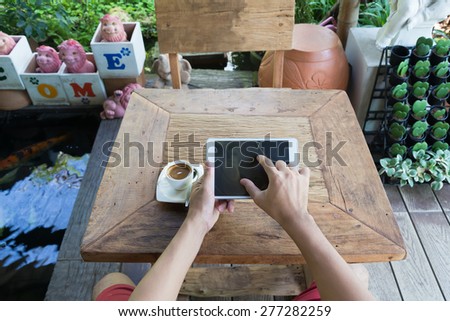 man work on your laptop in cofee cafe