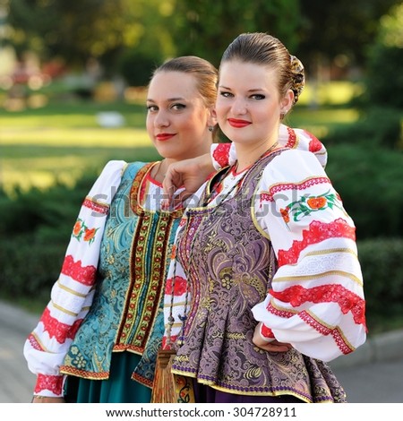 Orel, Russia, August 4, 2015: Orlovskaya Mozaika folk festival, two women in traditional Russian suits smiling