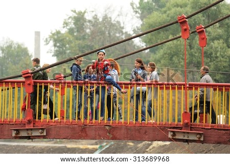 Orel, Russia, September 5, 2015: Resque team girls ready to jump from bridge