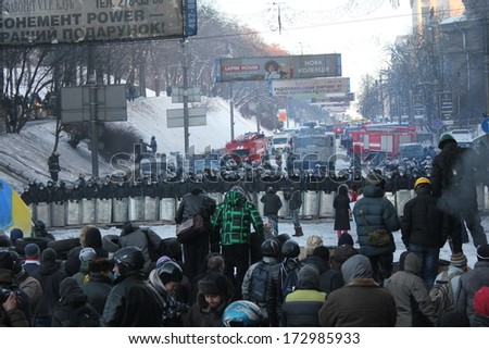 KIEV, UKRAINE Ã¢Â?Â? JAN 24, 2014: Second day of armistice between protesters and police on Hrushevskogo street in Kiev.