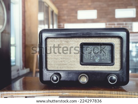 Retro Radio on wooden table vintage object