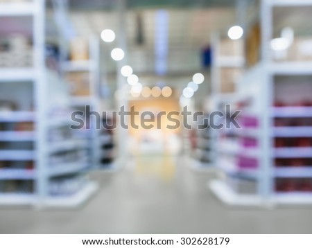 Blurred Shelf Display Storage in Retail shop Warehouse perspective
