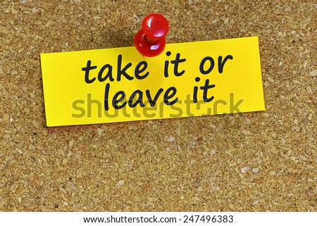 take it or leave it word on notepaper with brown cork background
