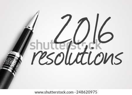 pen writes 2016 resolutions on paper