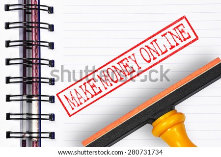 make money online rubber stamp on the note book.