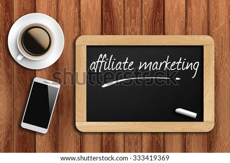 The coffee, phone  and chalkboard with word affiliate marketing