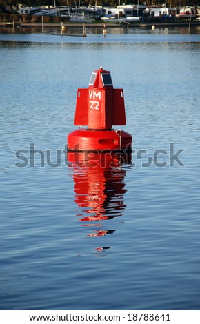 As a help with navigation floats a buoy the lake: it's working on a solar cell panel
