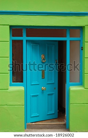 open welcoming blue door