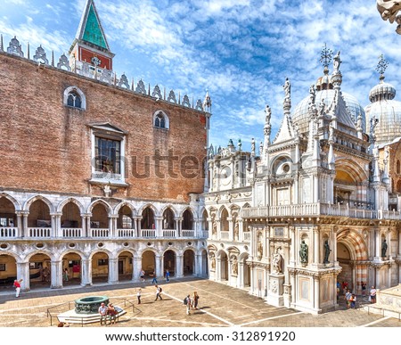 VENICE, September 5, 2014: Piazza San Marco in Venice, Italy. San Marco Cathedral - the Cathedral of Venice, which is a rare example of Byzantine architecture in Western Europe.