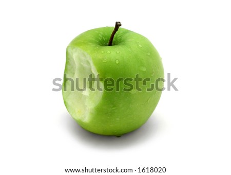 Green apple with water drops and bite