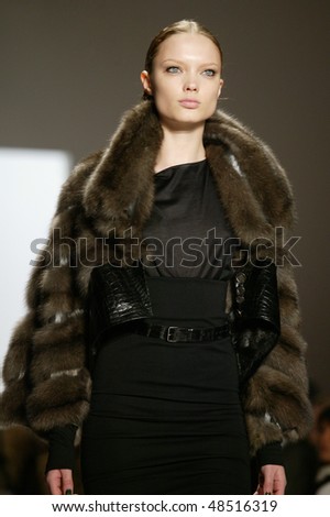 NEW YORK - FEBRUARY 16: A model walks the runway at the Dennis Basson Collection for Fall/Winter 2010 during Mercedes Benz Fashion Week on February 16, 2010 in New York