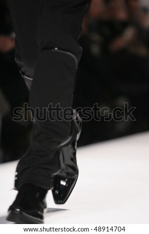 NEW YORK - FEBRUARY 14: A model is walking the runway at the Vassilios Kostetsos SHOJI Collection for Fall/Winter 2010 during Mercedes-Benz Fashion Week on February 14, 2010 in New York.