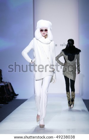 NEW YORK - FEBRUARY 16: A model walks the runway the Pamela Roland Collection for Fall/Winter 2010 during Mercedes-Benz Fashion Week on February 16, 2010 in New York.