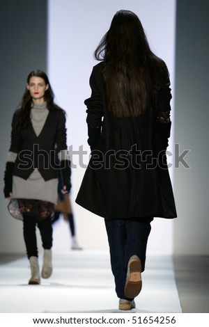 NEW YORK - FEBRUARY 11: A model is walking the runway at the Richard Chai Collection for Fall/Winter 2010 during Mercedes-Benz Fashion Week on February 11, 2010 in New York.