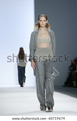 NEW YORK - SEPTEMBER 9: A model is walking the runway at the Richard Chai Collection for Spring/Summer 2011 during Mercedes-Benz Fashion Week on September 9, 2011 in New York.