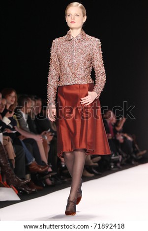 NEW YORK - FEBRUARY 14: Top model Hanne Gaby Odiele walks the runway at the Carolina Herrera Fall 2011 Collection presentation during Mercedes-Benz Fashion Week on February 14, 2011 in New York.
