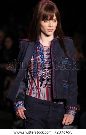NEW YORK - FEBRUARY 16: Top model Coco Rocha walks the runway at the Anna Sui Fall 2011 Collection presentation during Mercedes-Benz Fashion Week on February 16, 2011 in New York.