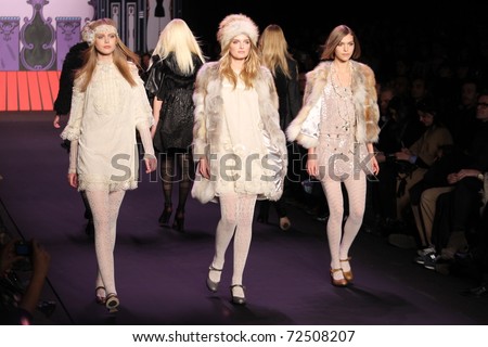 NEW YORK - FEBRUARY 16: Top models Frida (L), Lily (C), Aizona (R) walk the runway at the Anna Sui Fall 2011 presentation during Mercedes-Benz Fashion Week on February 16, 2011 in New York.