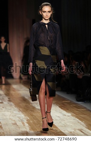 NEW YORK - FEBRUARY 11: Model walks the wooden runway at the Cynthia Rowley Fall 2011 Collection presentation during Mercedes-Benz Fashion Week on February 11, 2011 in New York.