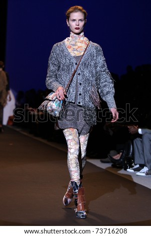 NEW YORK - FEBRUARY 13: Model walks the wooden runway at the Custo Barcelona Fall 2011 \