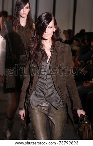 NEW YORK - FEBRUARY 15: Model walks the runway at the DIESEL BLACK GOLD Fall 2011 Collection presentation during Mercedes-Benz Fashion Week on February 15, 2011 in New York.