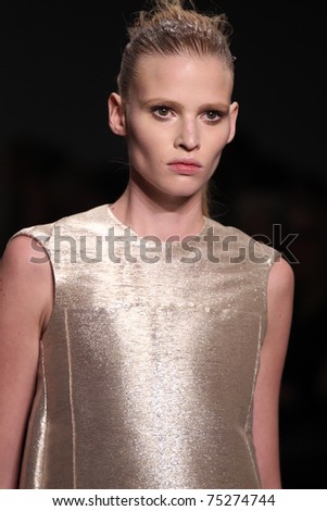 NEW YORK - FEBRUARY 17: No. 1 Ranked top model Lara Stone walks the runway at the Calvin Klein Fall 2011 Collection presentation during Mercedes-Benz Fashion Week on February 17, 2011 in New York.