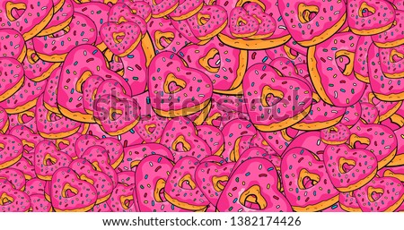 Colorful heart shaped sweet donuts endless pattern. From top view with copy space.