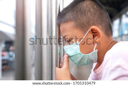 Similar – Image, Stock Photo Corona Thoughts | Fenced off green area with red and white barrier grid and red and white barrier tape that flutters in the evening wind