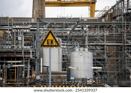 Similar – Image, Stock Photo The word EX in blue color on orange background, on the upper edge ventilation slots