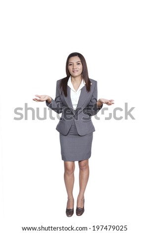 Portrait full body of a young attractive Asian business woman executive gesture beautiful pretty positive smiling suit presenting someting
