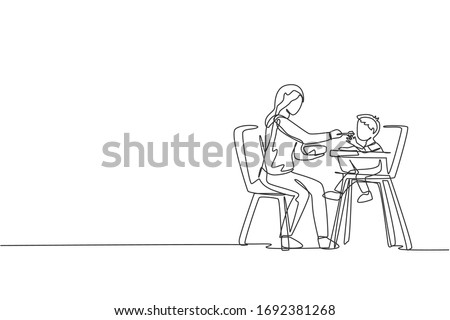 Similar – Image, Stock Photo Mother feeding Son with yoghurt at home