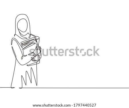 Single continuous line drawing of young female muslim businesswoman carrying annual report books to business meeting. Arab middle east cloth hijab and veil. One line draw design vector illustration